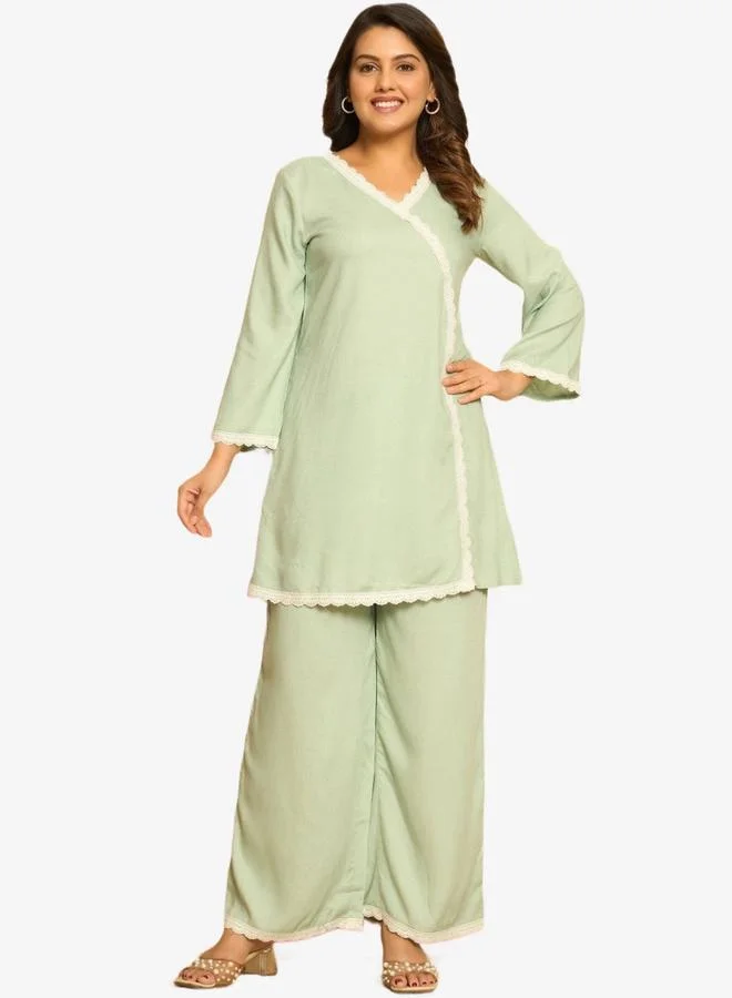 ملائم طقم متناسق بلون أخضر بحري